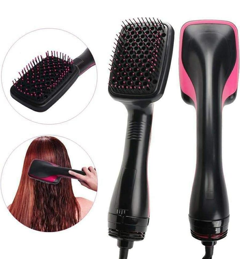 Electric hair straightener.  Revlon One-Step Volumizer Hair Dryer and Styler.  image