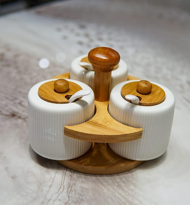 3 pcs sugar  dish on a bamboo stand   image