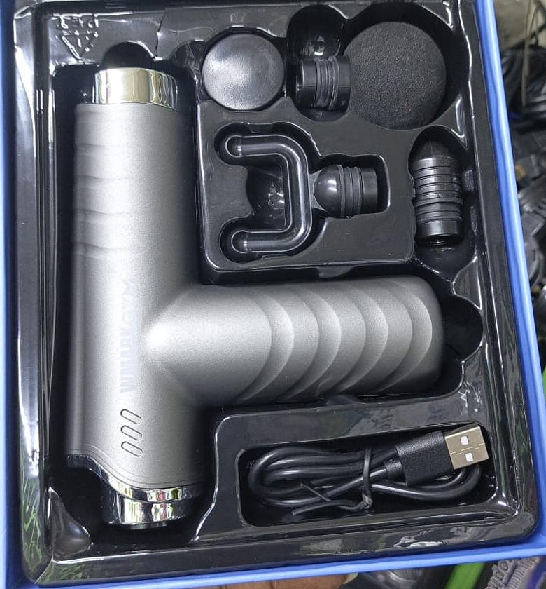 4 in 1  Deep Tissue Massage Gun designed for muscle relaxation and pain relief.  image