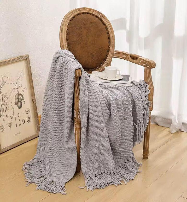 Textured knitted heavy throw blanket with tassels                                                                                    image