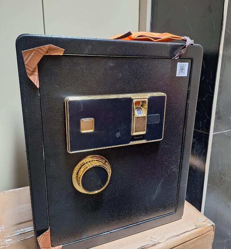 Biometric Fingerprint Safe Box. This is a large, black safe box designed for securing valuables, documents, and other important items.  image
