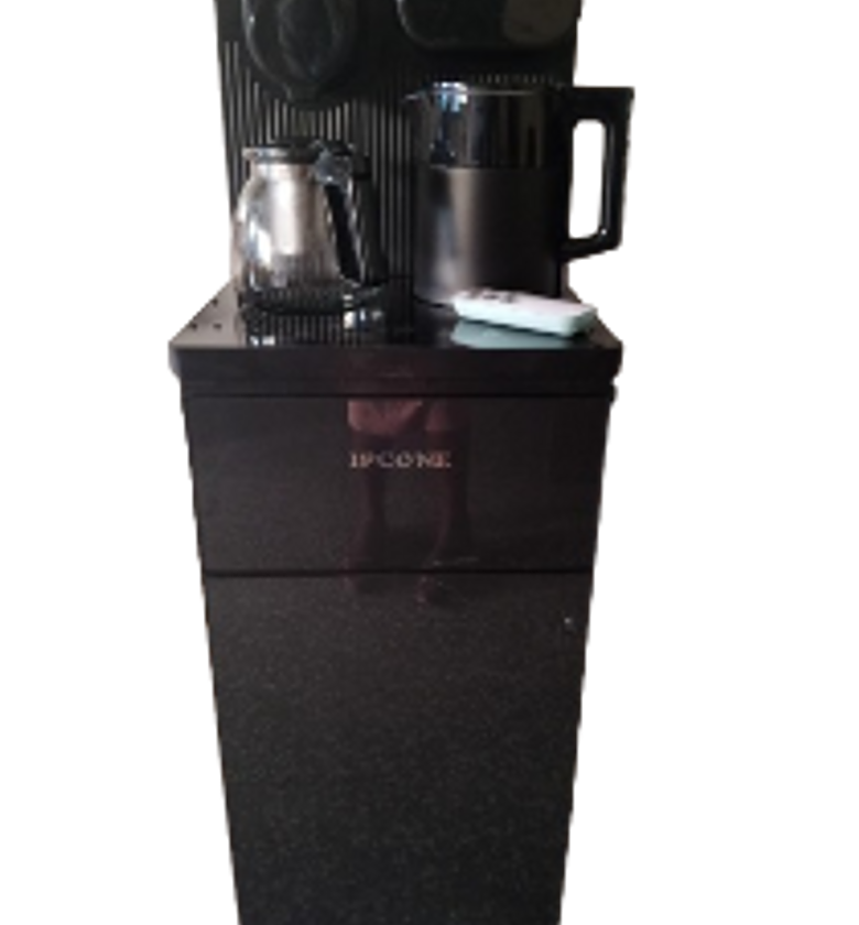 Water Dispenser. IPCONE Bottom Load Dispenser. Hot ,cold And Normal Features Woth A Kettle And A Coffee Maker Remote For Your Use At Your Confort. image