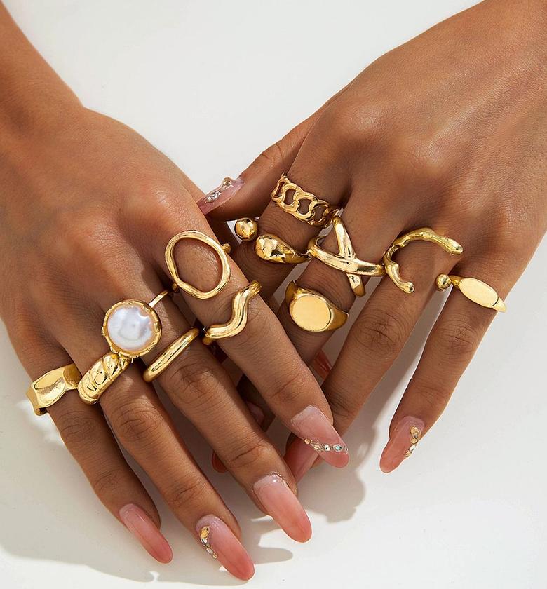 Statement gold-hued rings set image