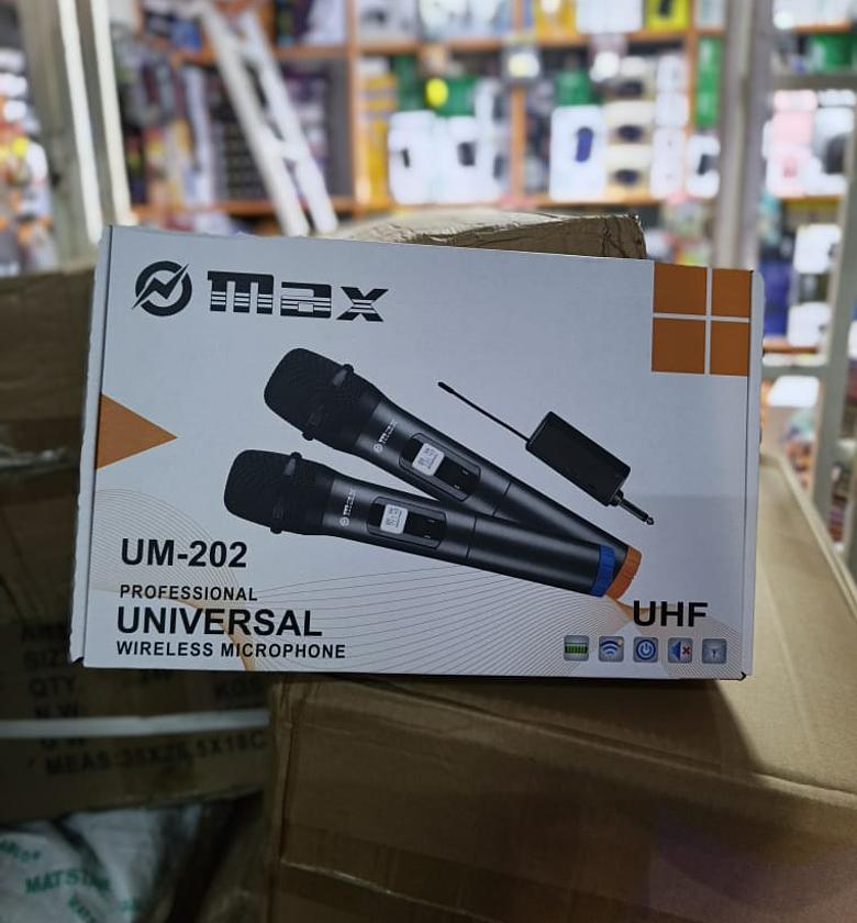 2 In 1 Microphone.  Professional Universal Wireless Microphone comes in two pieces. image