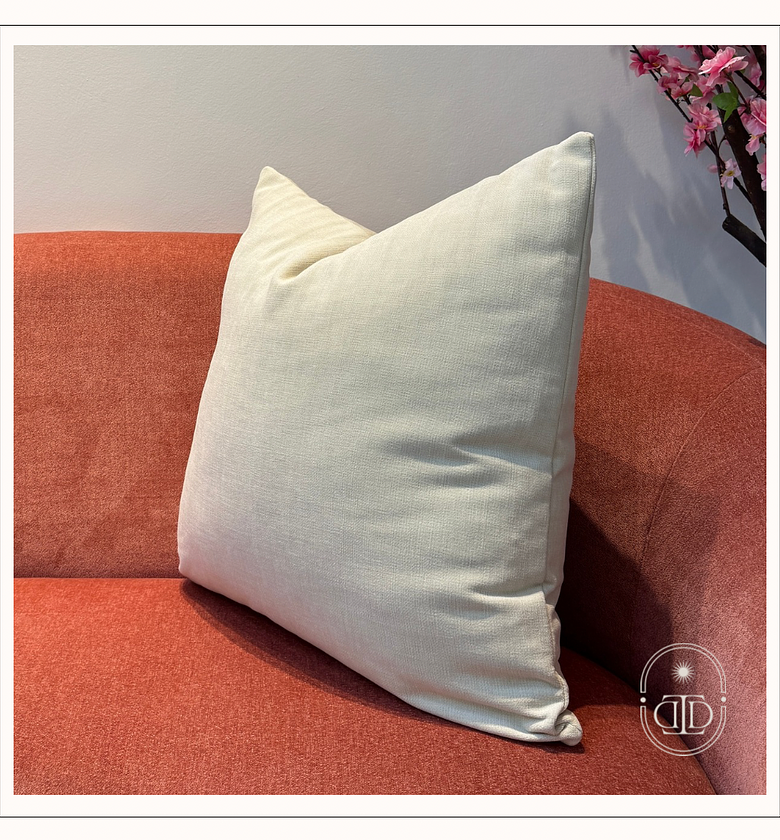 Cream cushion cover. image