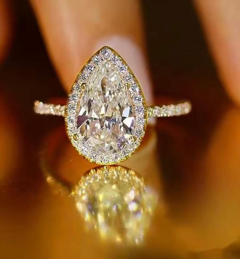 The Emerald Cushion Solitaire with Trillion Accents image