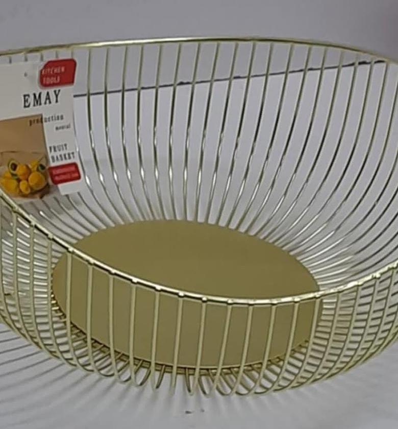 Metallic fruit basket with handles. image