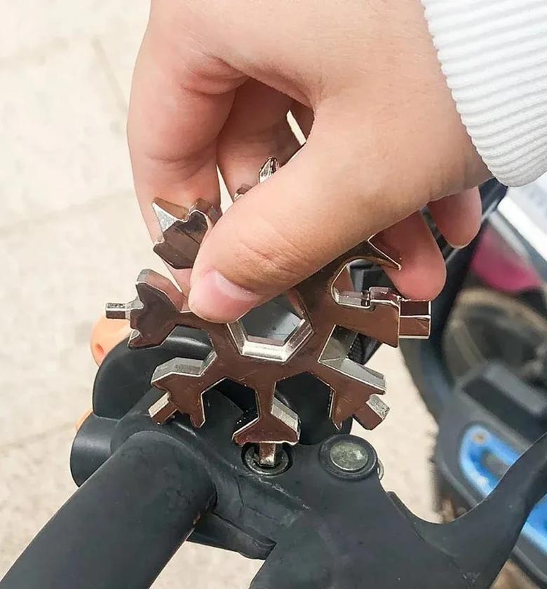 18-in-1 Snowflake Multi Tool with screwdriver, bottle opener, hex wrench, spanner set image