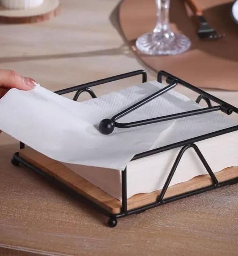 Metallic serviette holder with bamboo base. image