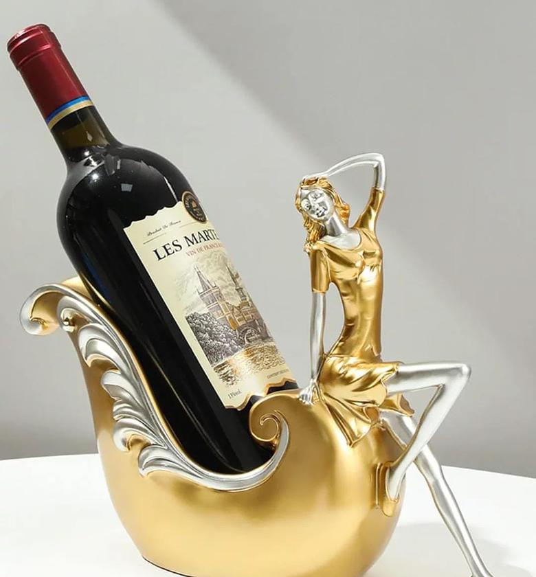 Creative Gold statue wine bottle holder. image