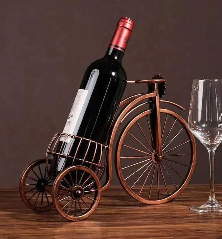 Vintage tricyle wine bottle holder. image