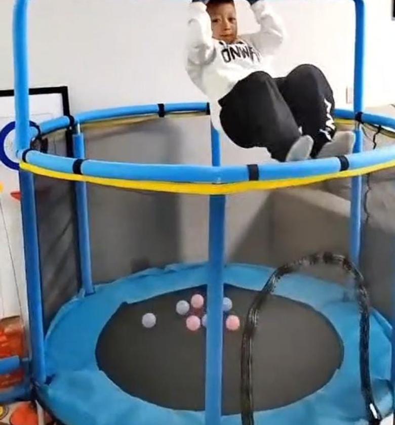 4FT Kids' Indoor/Outdoor Trampoline  with an integrated adjustable gymnastics bar{ Check out Video Below}  image