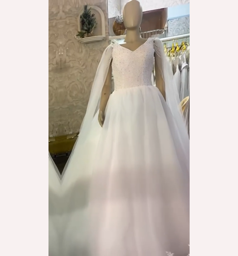 The Ethereal Seraphina V-Neck Ballgown with Cape Sleeves - FOR HIRE OR BUY image