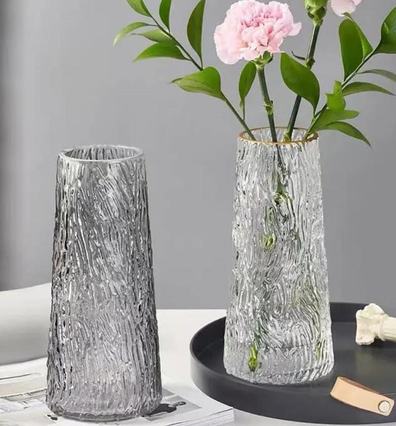 Glass flower base with golden rim  image