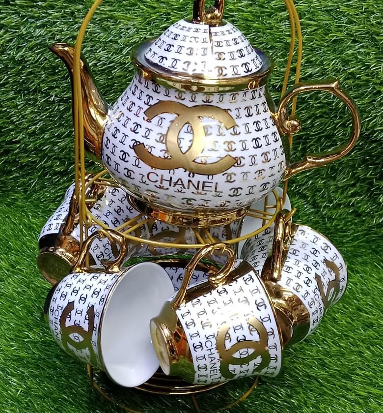 13pc Tea Set. Chanel-themed porcelain tea set.  image