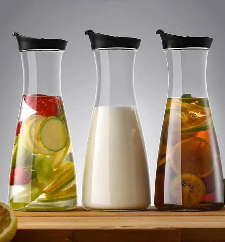 3pc glass carafe set. image