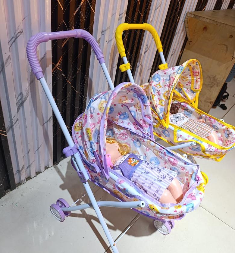 Kids stroller with doll  image