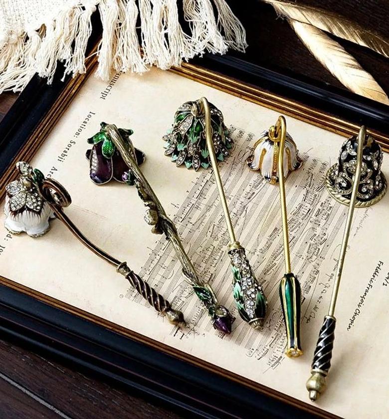 Antique candle snuffer image