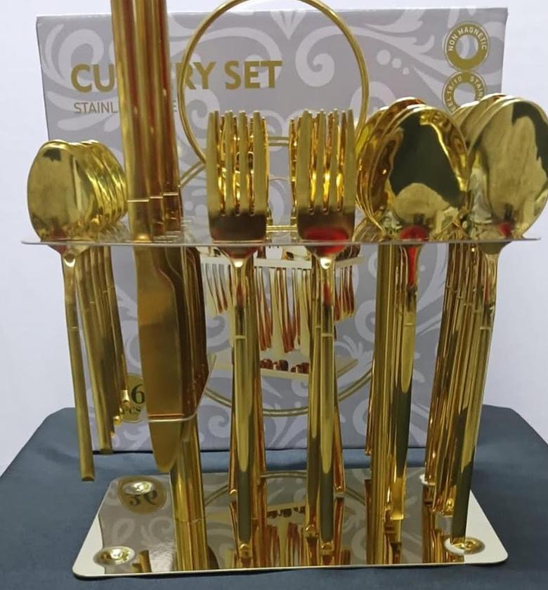36pc quality golden cutlery set. image