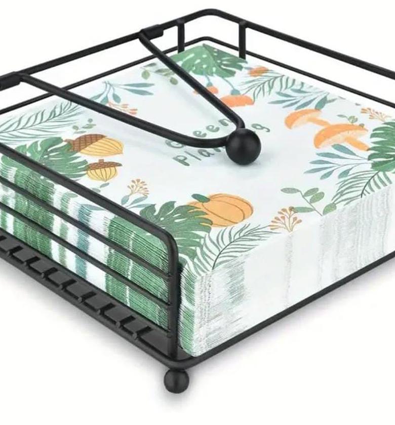 Metallic serviette holder. image