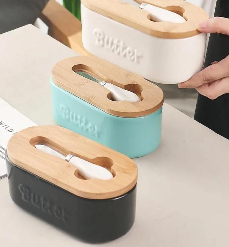 Ceramic butter box with airtight bamboo lid and spread knife. image