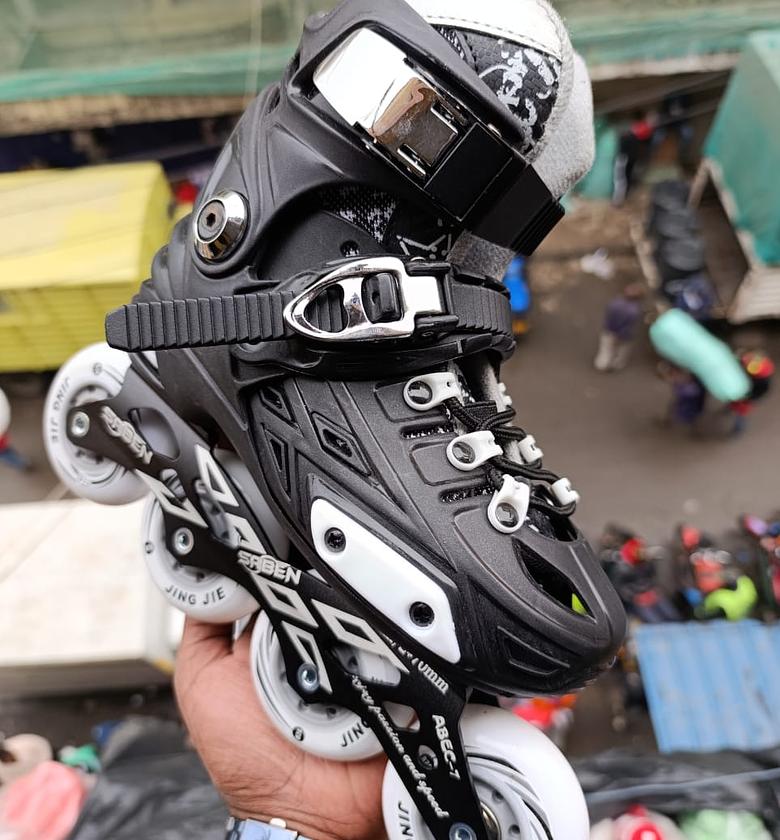 Inline Skate. Adjustable  Hard Boot  Skating Shoes Recommended by Coaches Size S: 29-32  M: 33-36  L: 37-40 image