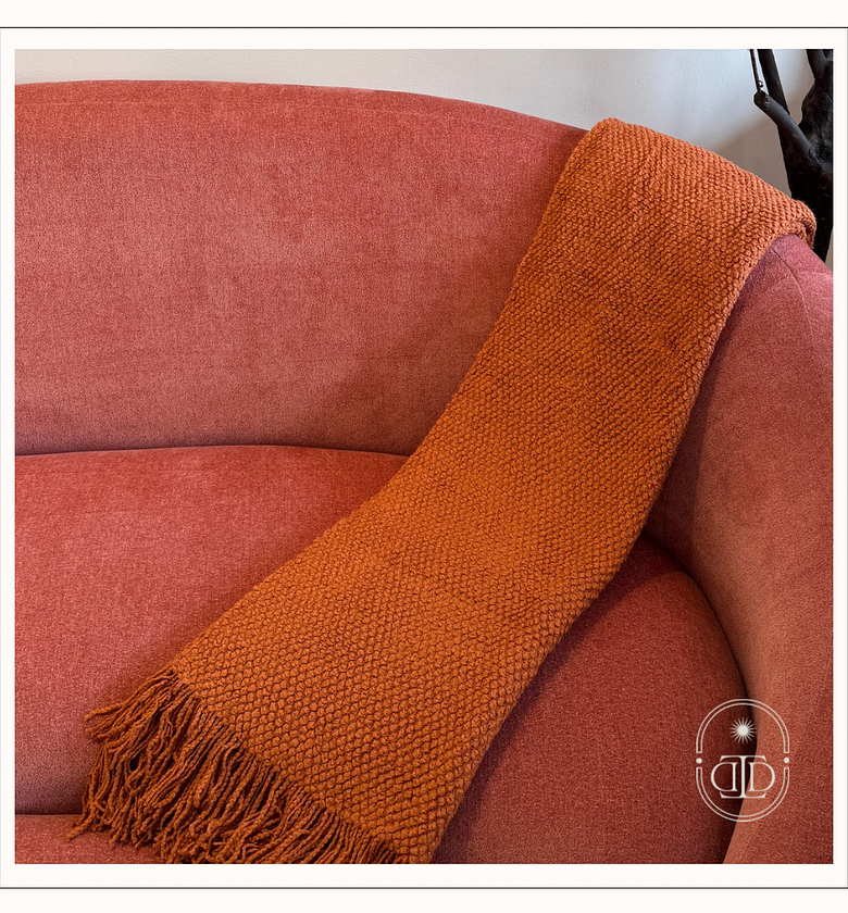 Burnt orange throw blanket with tassels. image