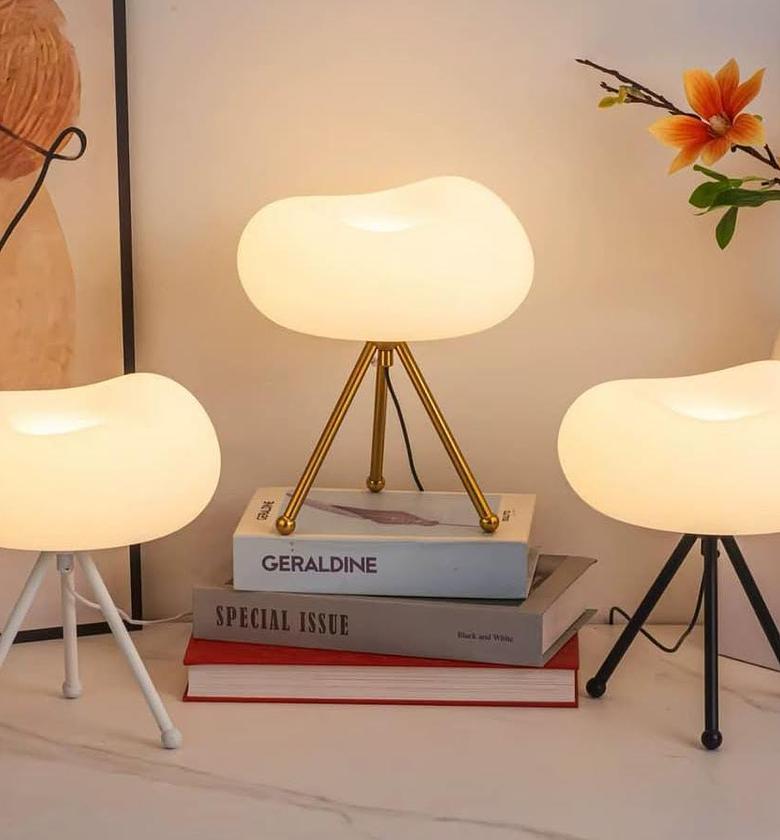 Creative cloud desk lamp. image