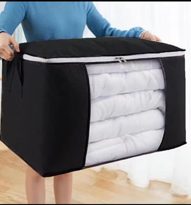 Canvas quilt /clothing storage organizer. Foldable with zipper image