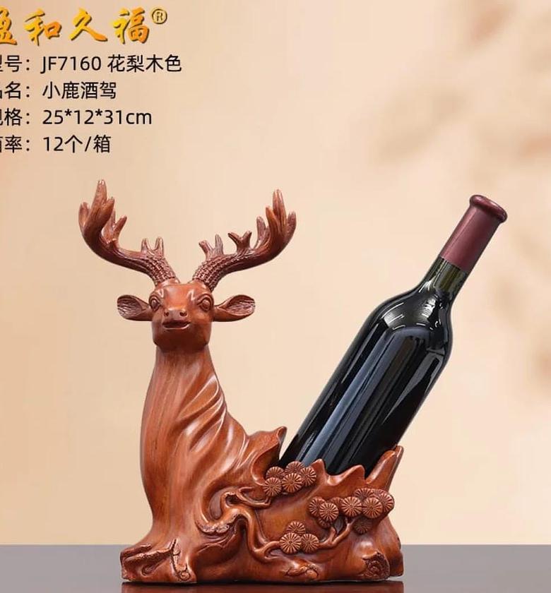Deer head decorative sculpture wine rack. image
