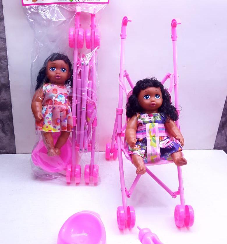 Doll plus a stroller  image