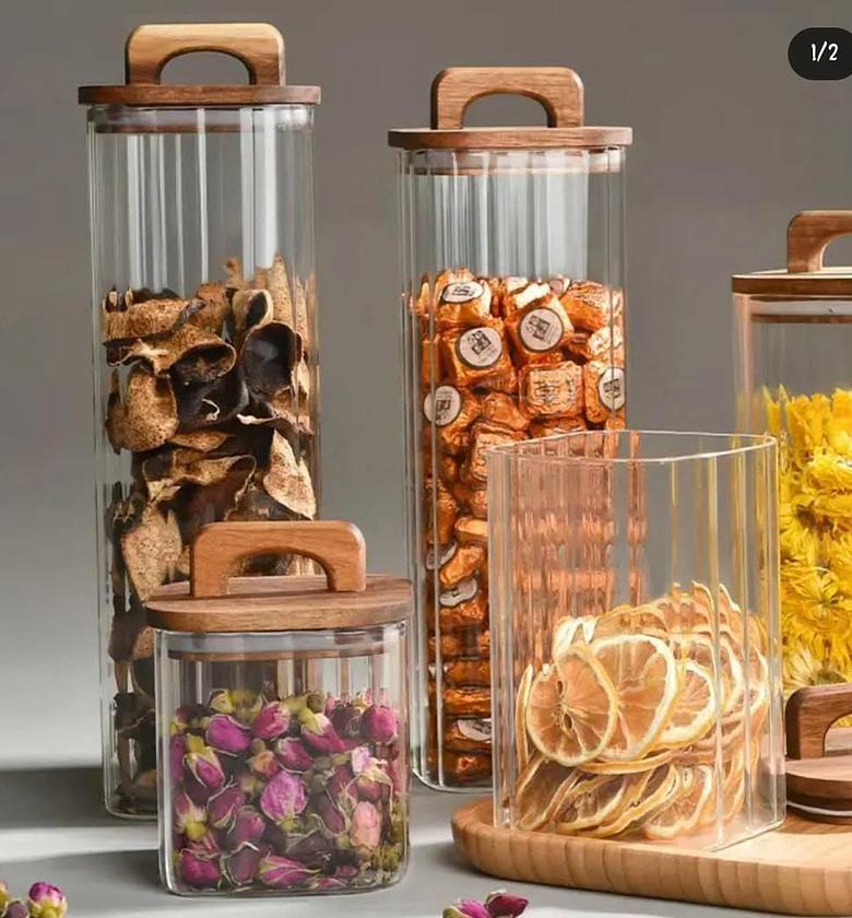 Ribbed glass storage container with bamboo lid. image