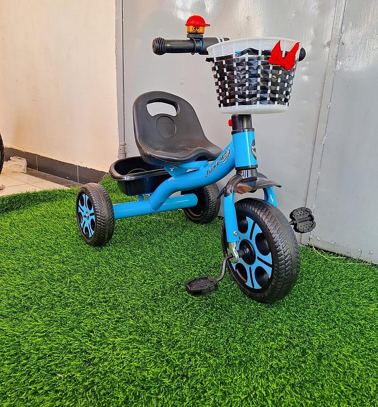 Kids Tricycle. Tricycle with a Push Handle and Storage Basket.  image