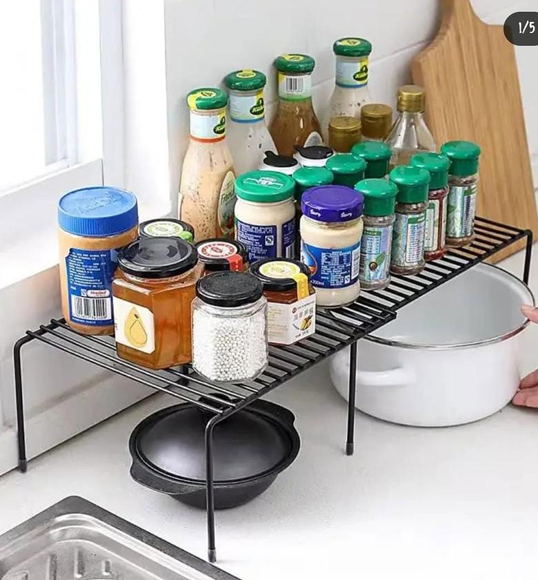 Expandable metallic shelf raiser. image