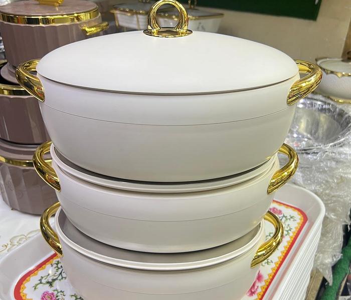A Set Of 3 Insulated Hotpots With Gold image