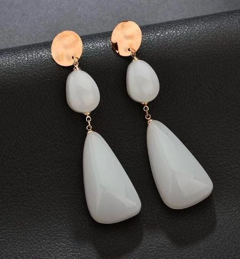 Whites on gold earrings image