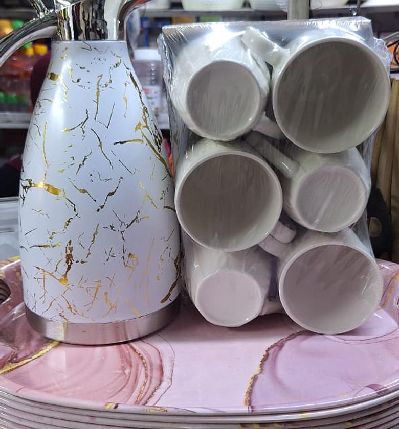 DINNER SET. 7pcs breakfast set. 1 white marble flask and 6pcs white coffee mugs image