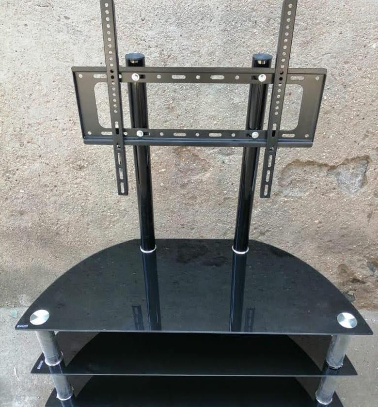 TV STAND. Executive glass  tv stand with wall mount image