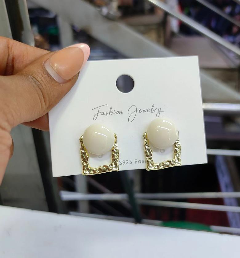 Whites on gold earrings image