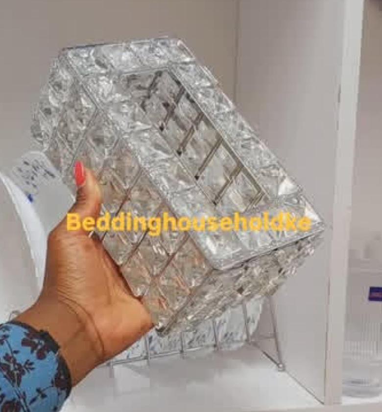 Silver metallic serviettes holder with crystals. image