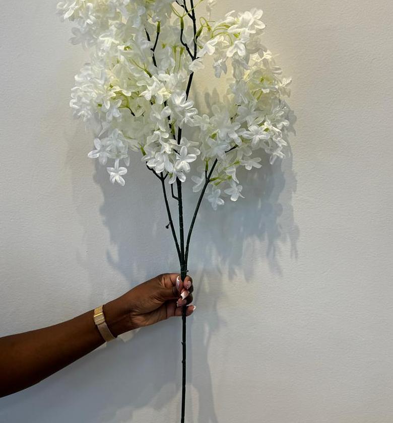  Faux lilac flowers.  image