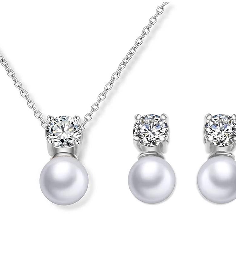 Classy imitation pearl and cubic zirconia image