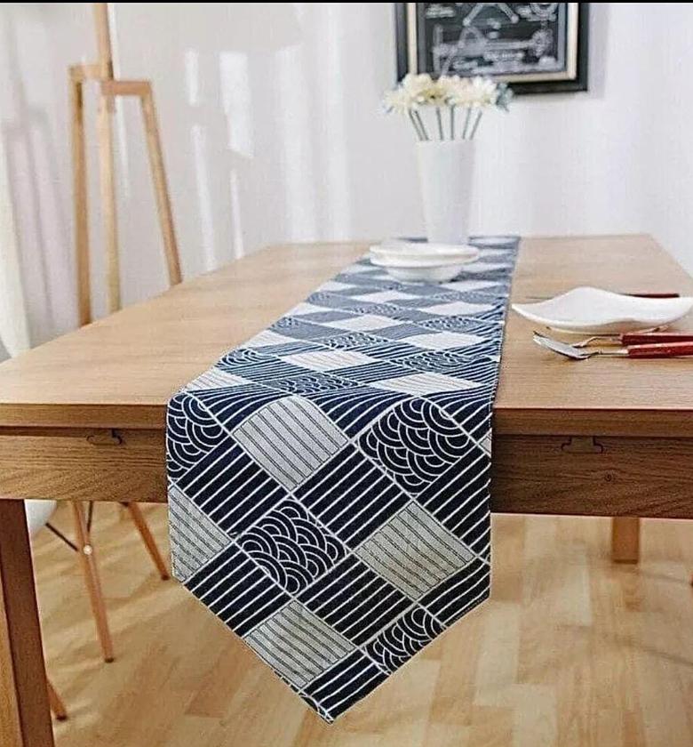 Simple geometric printed table runner to spice up your dining area. image