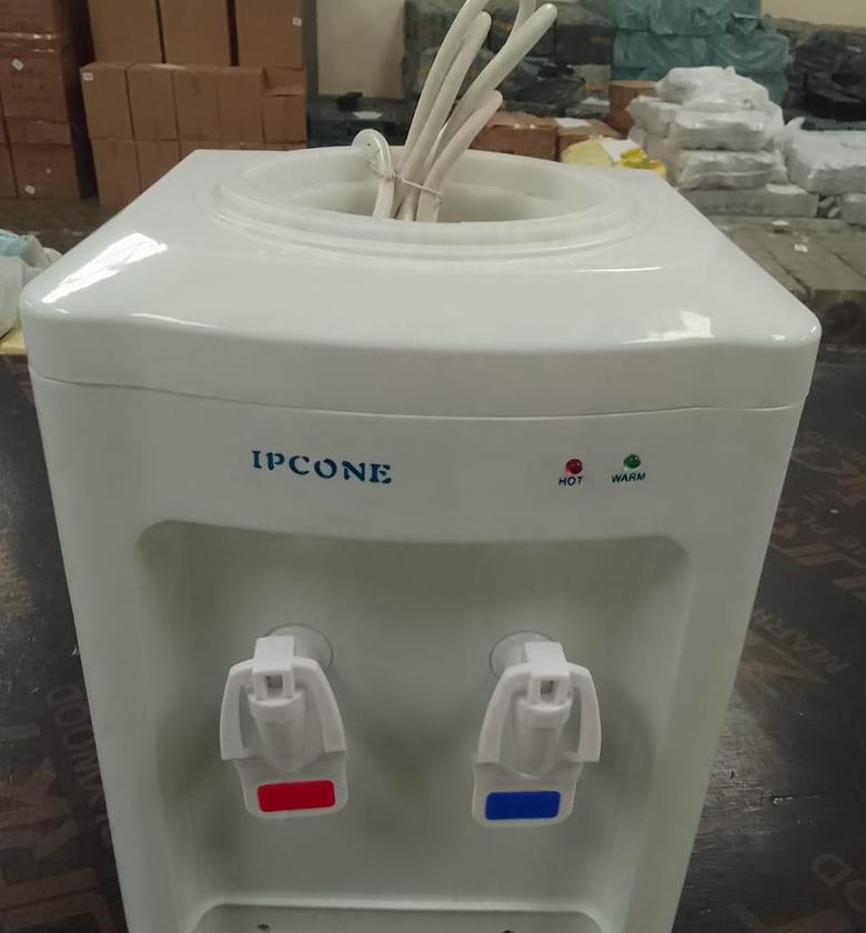 WATER DISPENSER. Table top ipcone dispenser  image