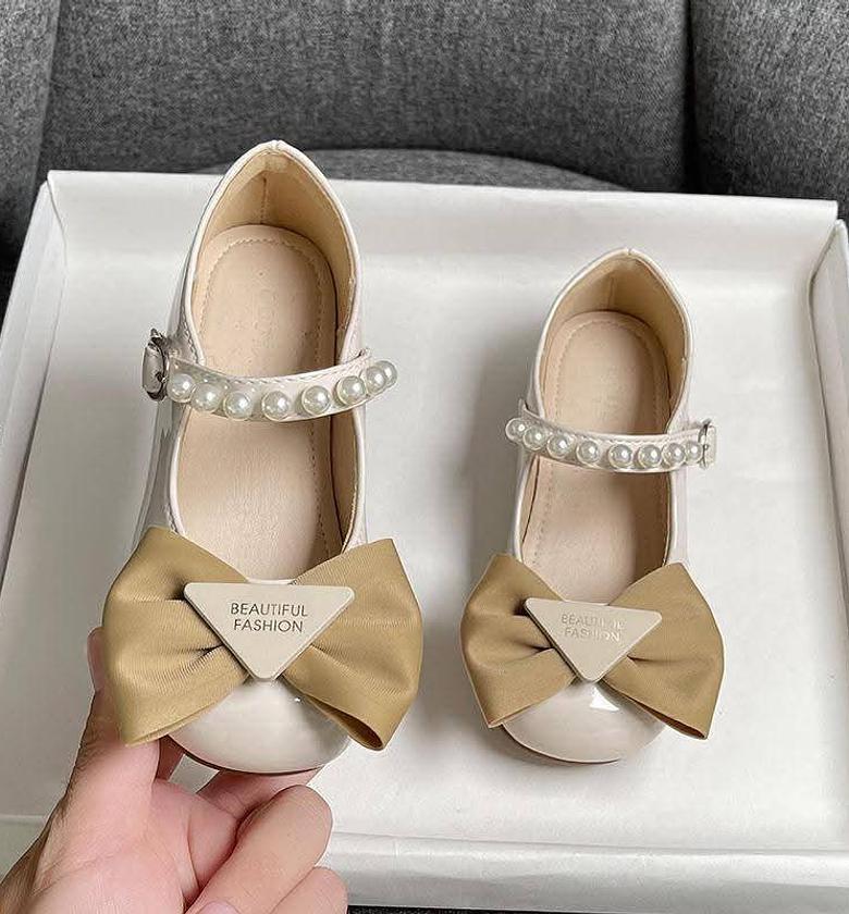 WET LOOK DOLL SHOES WITH A BOW TIE image
