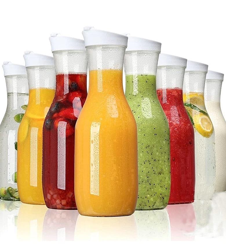 Clear pitcher jug , lightweight juice/water carafe with rubber flip lid  image