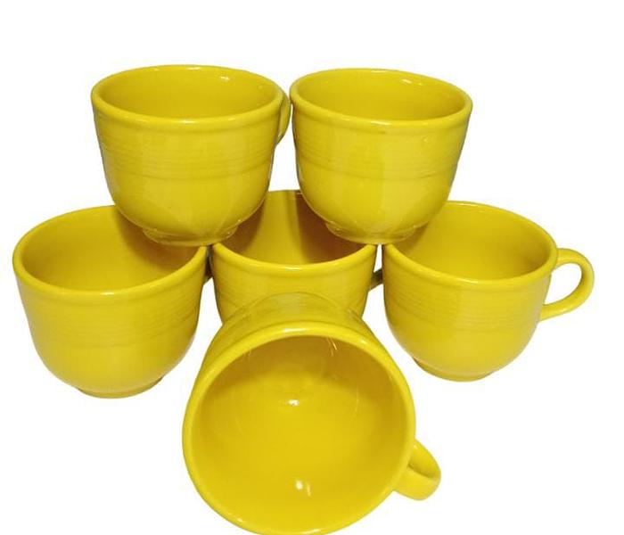 Cup saucer cup yellow. image