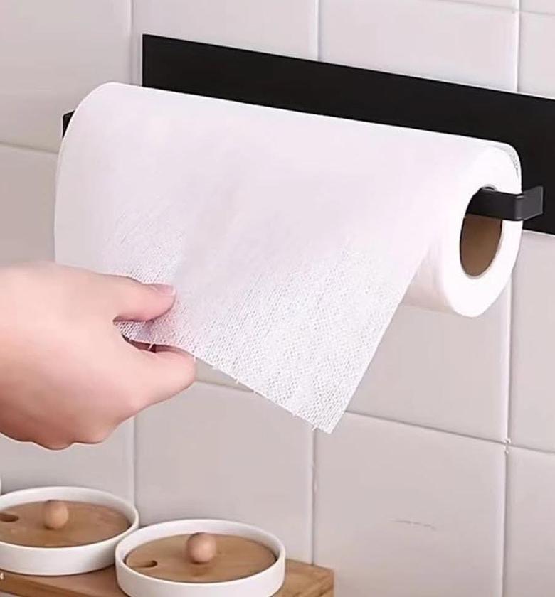 Adhesive paper towel holder. image