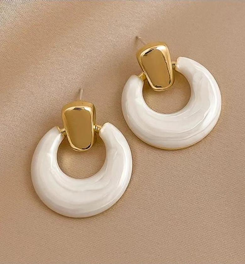 Whites on gold earrings image