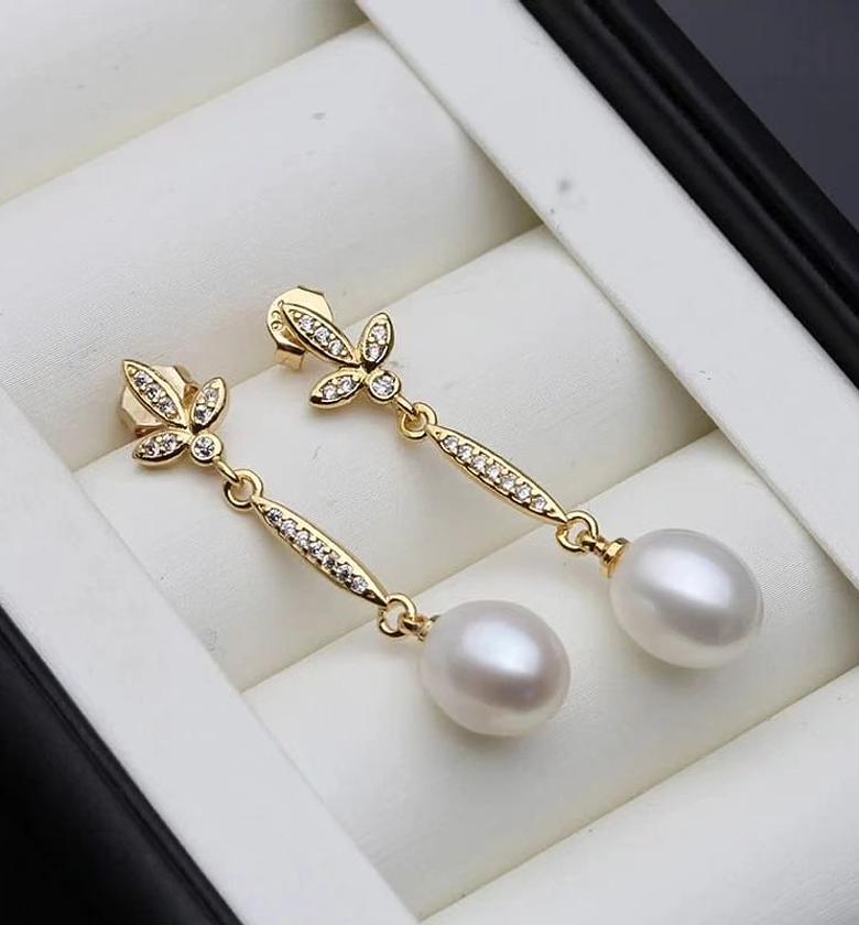 Pearls and crystals on gold image